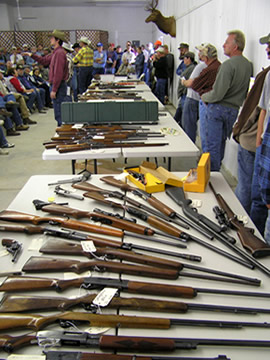 Live gun auction, Bott Realty